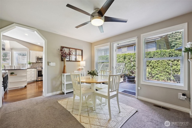 1910 Lenox Ct NW, Olympia, WA 98502 - dining area with carpet and a ceiling fan