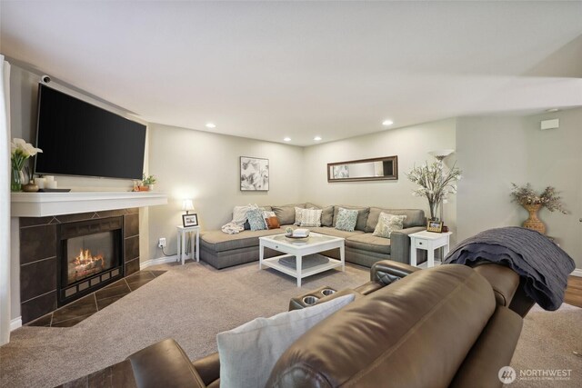 1910 Lenox Ct NW, Olympia, WA 98502 - living room featuring recessed lighting, a tiled fireplace, and carpet