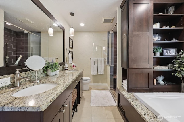 1910 Lenox Ct NW, Olympia, WA 98502 - bathroom featuring vanity, tile patterned flooring, a stall shower, and recessed lighting