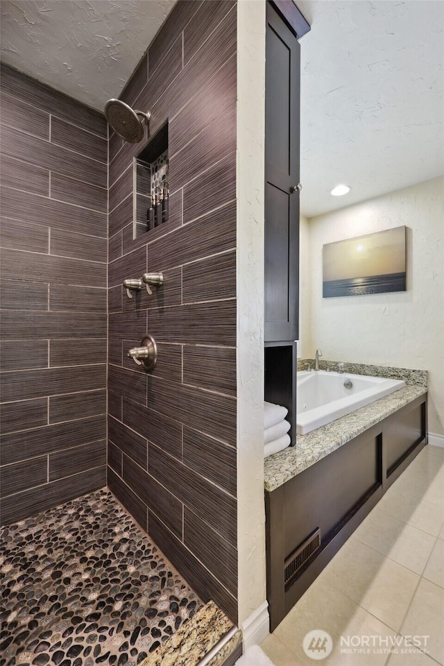 1910 Lenox Ct NW, Olympia, WA 98502 - bathroom featuring tiled shower and tile patterned flooring