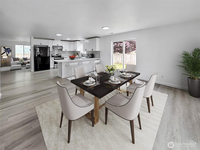 20112 14th Avenue Ct E, Spanaway, WA 98387 - dining area with plenty of natural light, light wood-style flooring, and recessed lighting