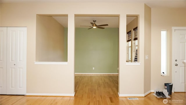 21502 51st Ave S Unit 44, Kent, WA 98032 - entryway with ceiling fan and wood finished floors