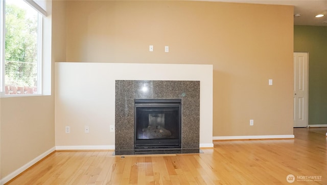 21502 51st Ave S Unit 44, Kent, WA 98032 - detailed view of wood finished floors, recessed lighting, and a tiled fireplace