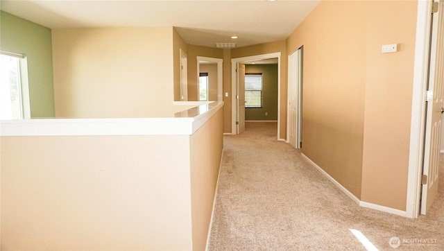 21502 51st Ave S Unit 44, Kent, WA 98032 - hall with light colored carpet and an upstairs landing