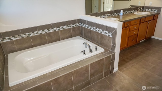 21502 51st Ave S Unit 44, Kent, WA 98032 - bathroom with a garden tub, double vanity, and tile patterned floors