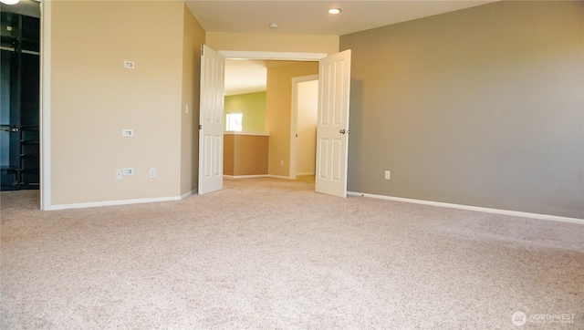 21502 51st Ave S Unit 44, Kent, WA 98032 - unfurnished bedroom with light carpet and recessed lighting