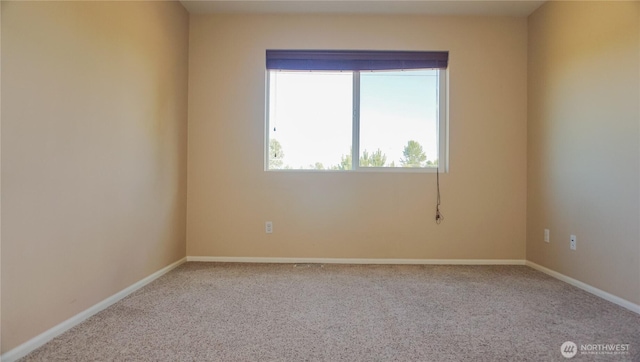 21502 51st Ave S Unit 44, Kent, WA 98032 - carpeted empty room featuring baseboards
