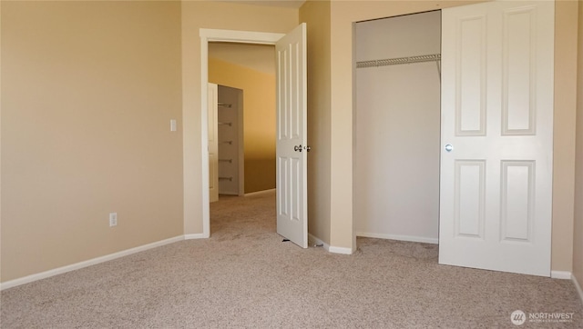 21502 51st Ave S Unit 44, Kent, WA 98032 - unfurnished bedroom featuring carpet and a closet