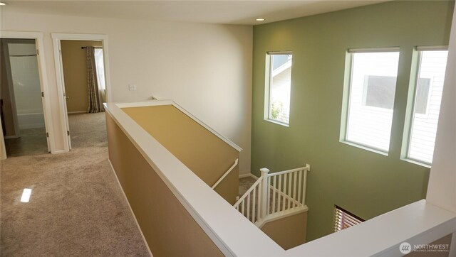 21502 51st Ave S Unit 44, Kent, WA 98032 - hall with an upstairs landing, healthy amount of natural light, carpet flooring, and recessed lighting