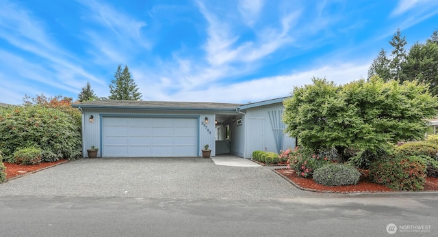 23704 9th Pl W, Bothell, WA 98021 - view of front of property with asphalt driveway and a garage