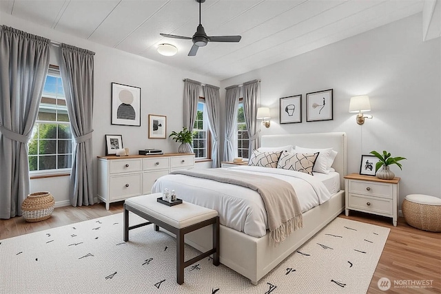 23704 9th Pl W, Bothell, WA 98021 - bedroom with light wood-style flooring and ceiling fan