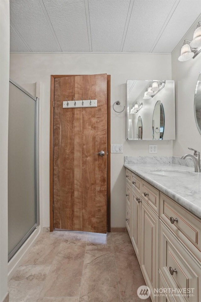 23704 9th Pl W, Bothell, WA 98021 - bathroom featuring vanity, a shower stall, and a textured ceiling