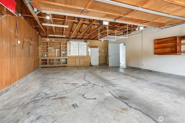 23704 9th Pl W, Bothell, WA 98021 - garage with a garage door opener and freestanding refrigerator