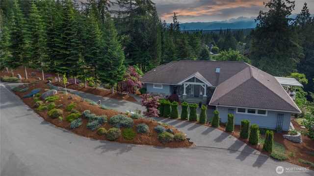 63 Red Cedar Ln, Port Ludlow, WA 98365 - aerial view at dusk of a mountain view