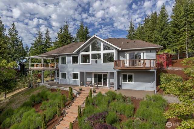 63 Red Cedar Ln, Port Ludlow, WA 98365 - back of house featuring a patio area and a deck