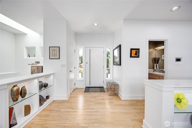 63 Red Cedar Ln, Port Ludlow, WA 98365 - entryway with light wood-style flooring and recessed lighting