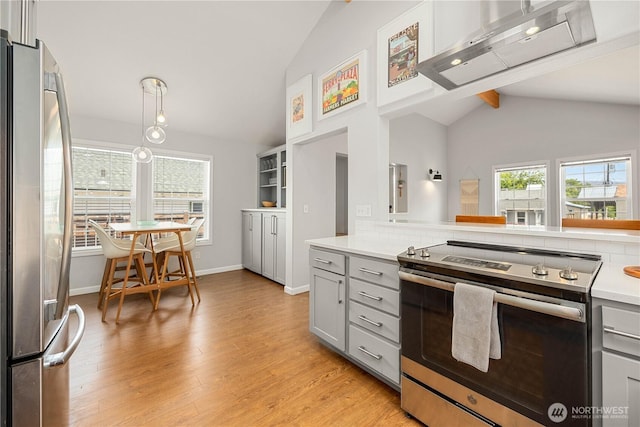 244 N Emerson Ave, Wenatchee, WA 98801 - kitchen with appliances with stainless steel finishes, gray cabinets, light countertops, and light wood finished floors