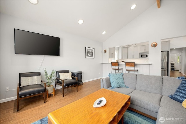 244 N Emerson Ave, Wenatchee, WA 98801 - living room with high vaulted ceiling, recessed lighting, light wood finished floors, and beamed ceiling