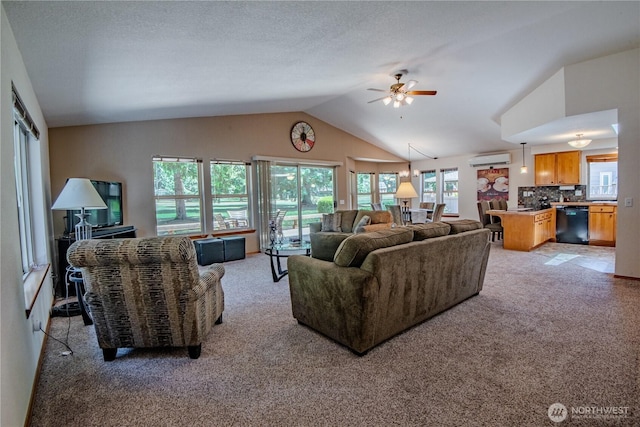180N Mount Christie Dr, Hoodsport, WA 98548 - living area with light carpet, a wall unit AC, lofted ceiling, and ceiling fan
