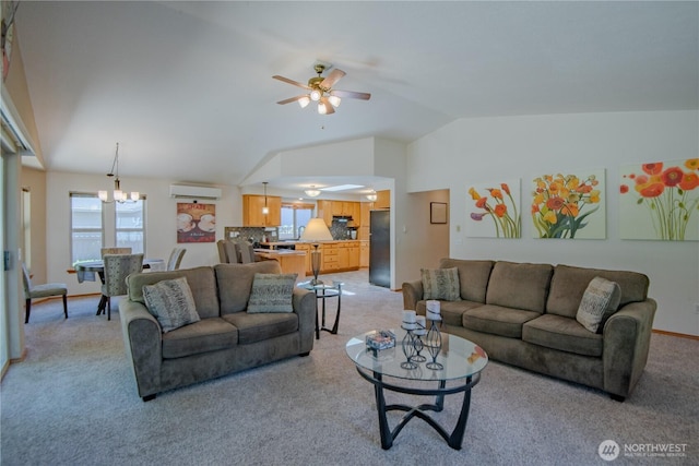 180N Mount Christie Dr, Hoodsport, WA 98548 - living room with a wall mounted AC, lofted ceiling, light colored carpet, a ceiling fan, and a chandelier