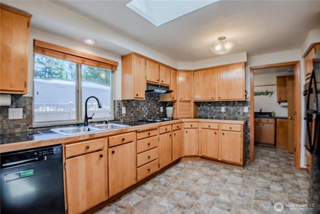 180N Mount Christie Dr, Hoodsport, WA 98548 - kitchen with black appliances, a sink, backsplash, and a skylight