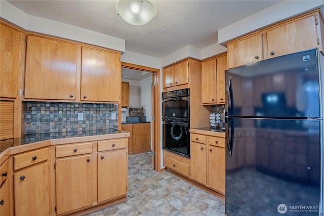 180N Mount Christie Dr, Hoodsport, WA 98548 - kitchen featuring black appliances, decorative backsplash, a textured ceiling, and light flooring