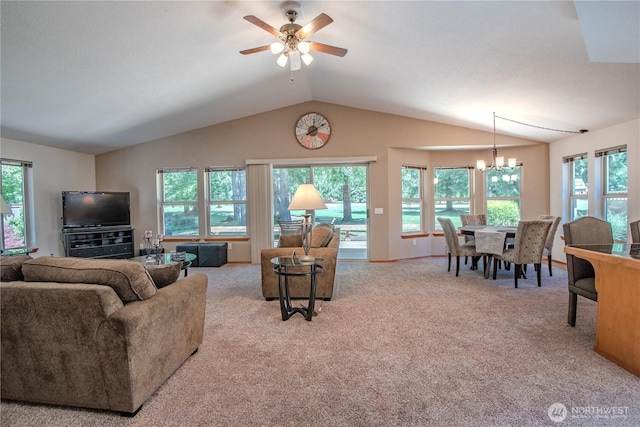 180N Mount Christie Dr, Hoodsport, WA 98548 - living room featuring vaulted ceiling, healthy amount of natural light, carpet flooring, ceiling fan, and a chandelier