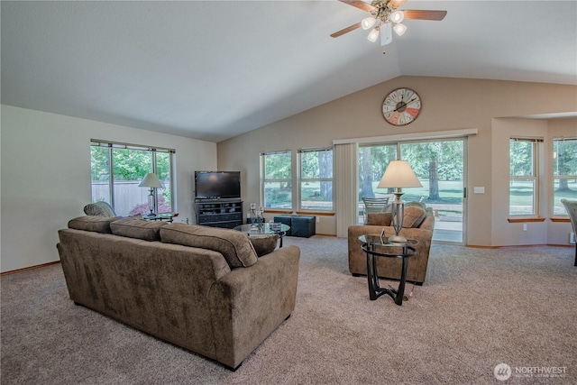 180N Mount Christie Dr, Hoodsport, WA 98548 - living area with carpet floors, vaulted ceiling, plenty of natural light, ceiling fan, and baseboards