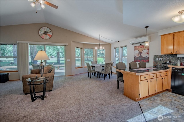 180N Mount Christie Dr, Hoodsport, WA 98548 - kitchen with dishwasher, a wall unit AC, healthy amount of natural light, a peninsula, and vaulted ceiling