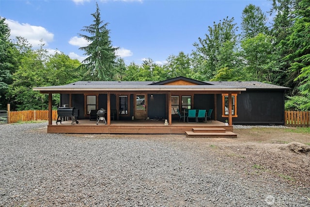 10455 Woodchuck Ln SE, Port Orchard, WA 98367 - rear view of house featuring a deck