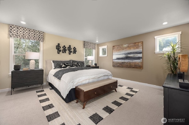 505 184th Street Ct E Unit 53, Spanaway, WA 98387 - bedroom with baseboards, recessed lighting, and light carpet
