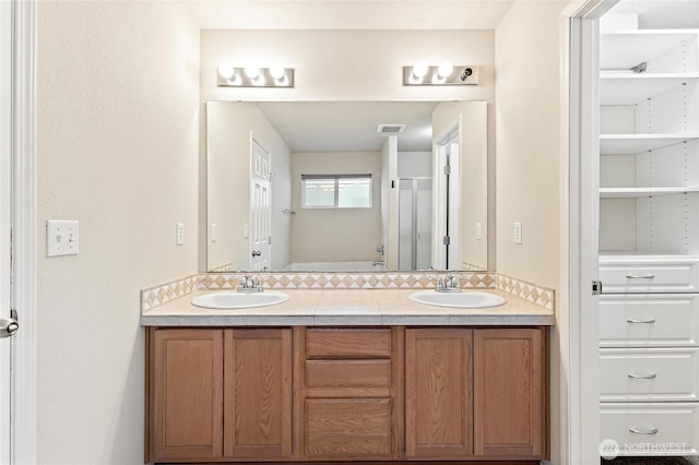 3632 London Loop NE, Lacey, WA 98516 - bathroom with double vanity and a shower stall