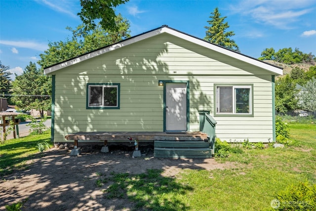 101 N Elm St N, Omak, WA 98841 - back of house featuring a lawn
