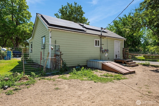101 N Elm St N, Omak, WA 98841 - rear view of house with solar panels