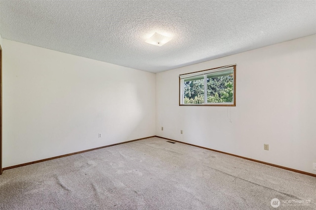1001 Garden Dr, Lynden, WA 98264 - carpeted empty room with a textured ceiling and baseboards