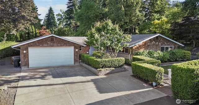 7979 NE 28th St, Medina, WA 98039 - single story home featuring a garage, driveway, and a shingled roof