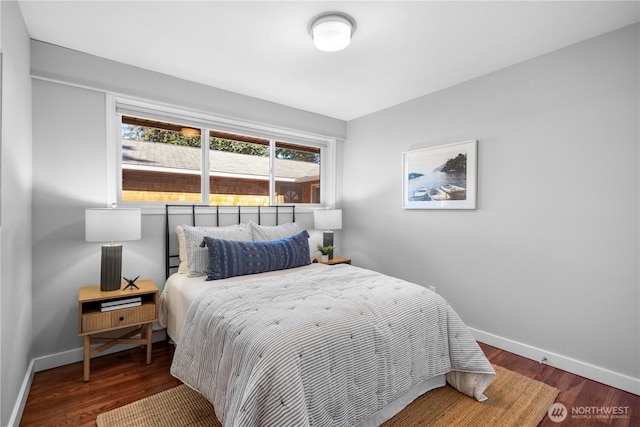 7979 NE 28th St, Medina, WA 98039 - bedroom with baseboards and wood finished floors