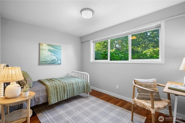7979 NE 28th St, Medina, WA 98039 - bedroom featuring wood finished floors and baseboards