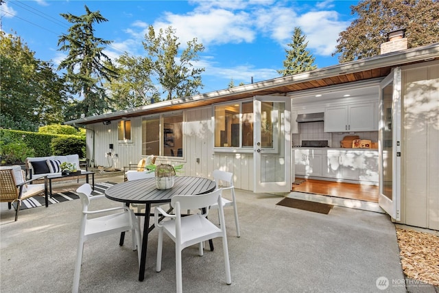 7979 NE 28th St, Medina, WA 98039 - view of patio featuring an outdoor hangout area
