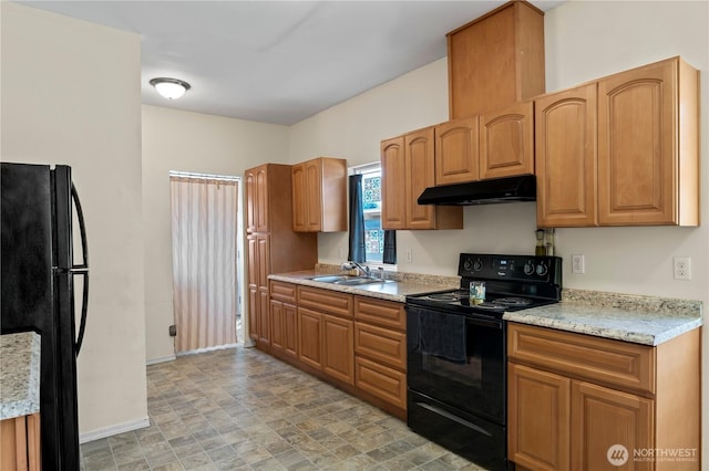 2415 Cedar St, Everett, WA 98201 - kitchen featuring black appliances, under cabinet range hood, and light stone countertops