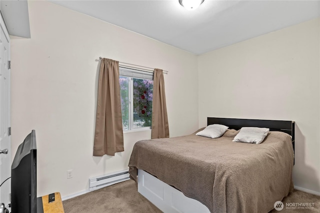 2415 Cedar St, Everett, WA 98201 - carpeted bedroom with a baseboard heating unit and baseboards