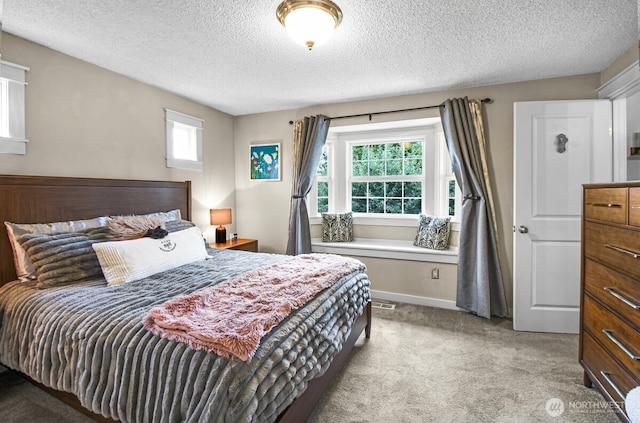 12907 SE 245th St, Kent, WA 98030 - bedroom featuring carpet flooring, multiple windows, and a textured ceiling