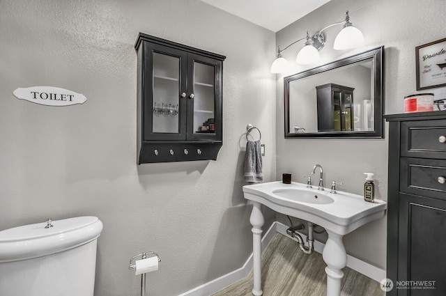 12907 SE 245th St, Kent, WA 98030 - bathroom featuring wood finished floors and toilet
