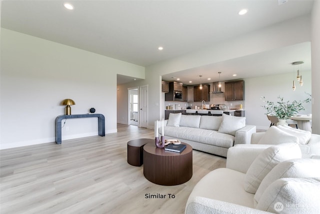 4246 W Sandy Ct, Moses Lake, WA 98837 - living area with light wood-style flooring and recessed lighting