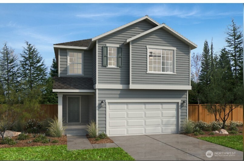 867 Smith St Unit 29, Buckley, WA 98321 - traditional-style house with an attached garage, concrete driveway, and a shingled roof