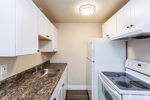 5303 Parker Rd E, Sumner, WA 98390 - kitchen with white range with electric cooktop, under cabinet range hood, a sink, baseboards, and white cabinetry