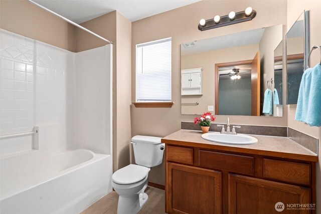 134 Wind River Dr, Chehalis, WA 98532 - full bathroom with toilet, ceiling fan, vanity, shower / bath combination, and tile patterned floors
