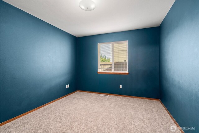 134 Wind River Dr, Chehalis, WA 98532 - carpeted empty room featuring baseboards
