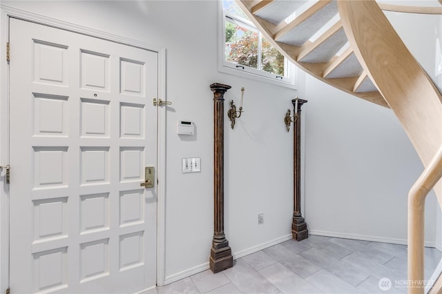 2053 Minor Ave E Unit 12, Seattle, WA 98102 - entrance foyer featuring light tile patterned floors and baseboards