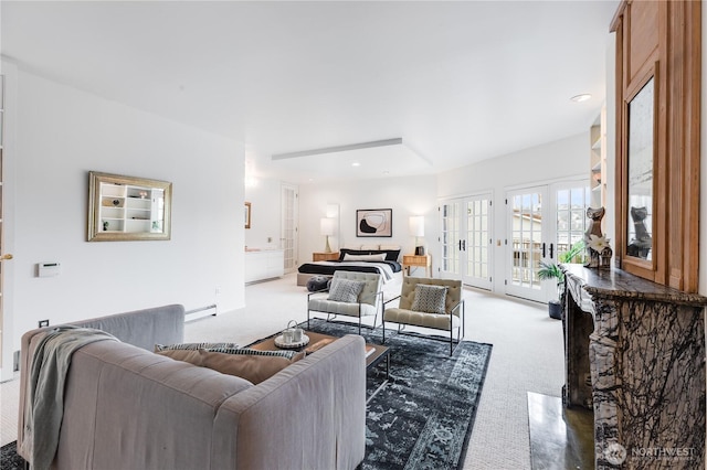 2053 Minor Ave E Unit 12, Seattle, WA 98102 - living area featuring carpet floors, french doors, a baseboard heating unit, and recessed lighting